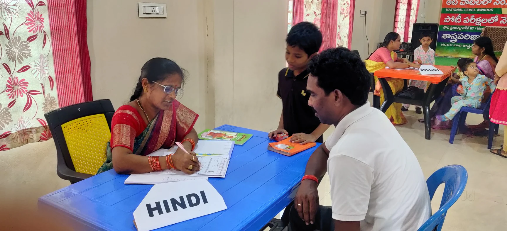 Hindi teacher with parents